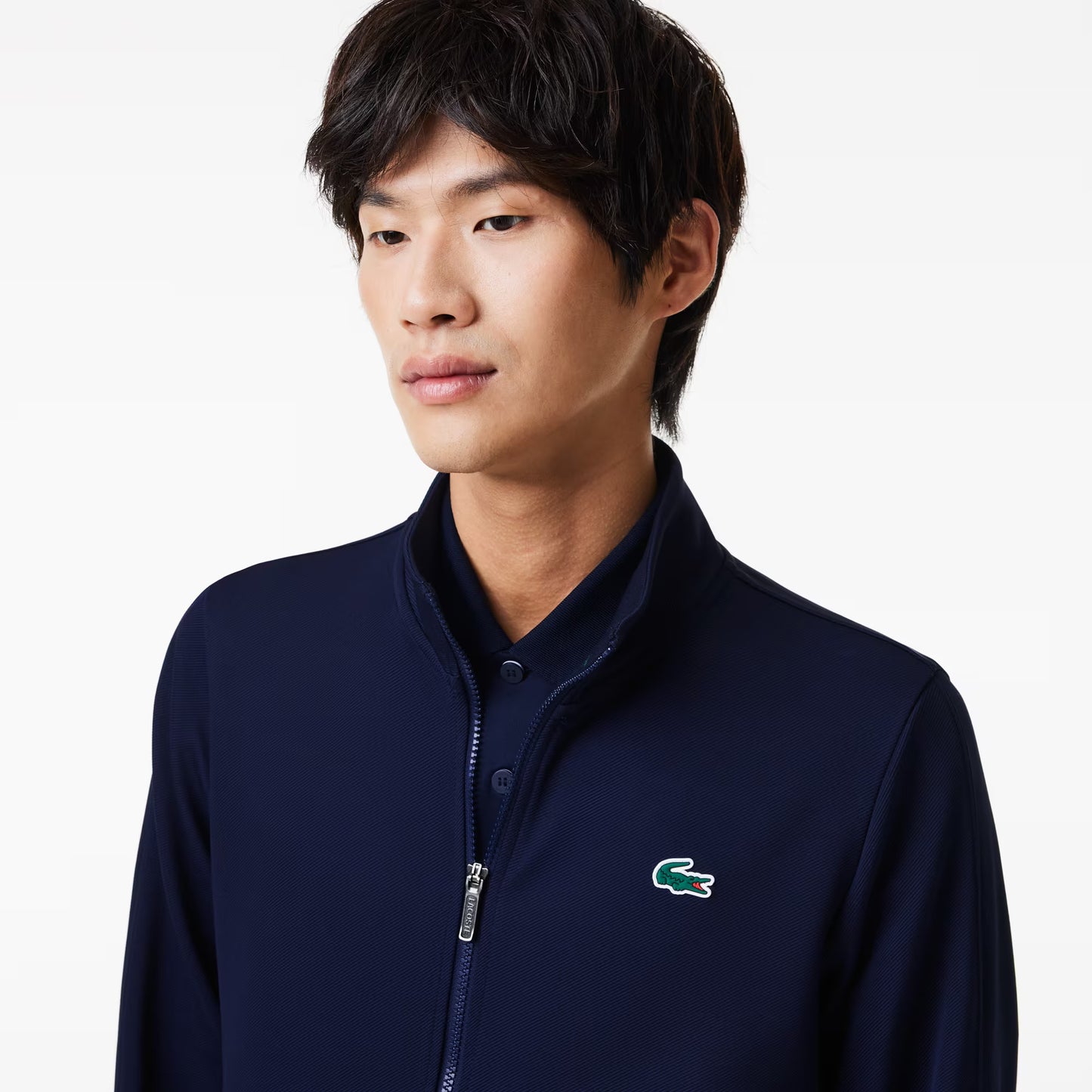 Veste Lacoste de couleur Marine