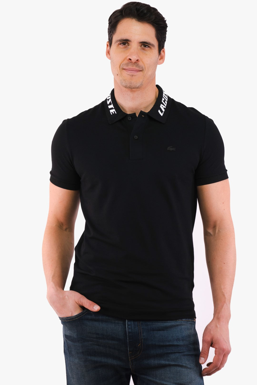 Polo Lacoste de couleur Noir