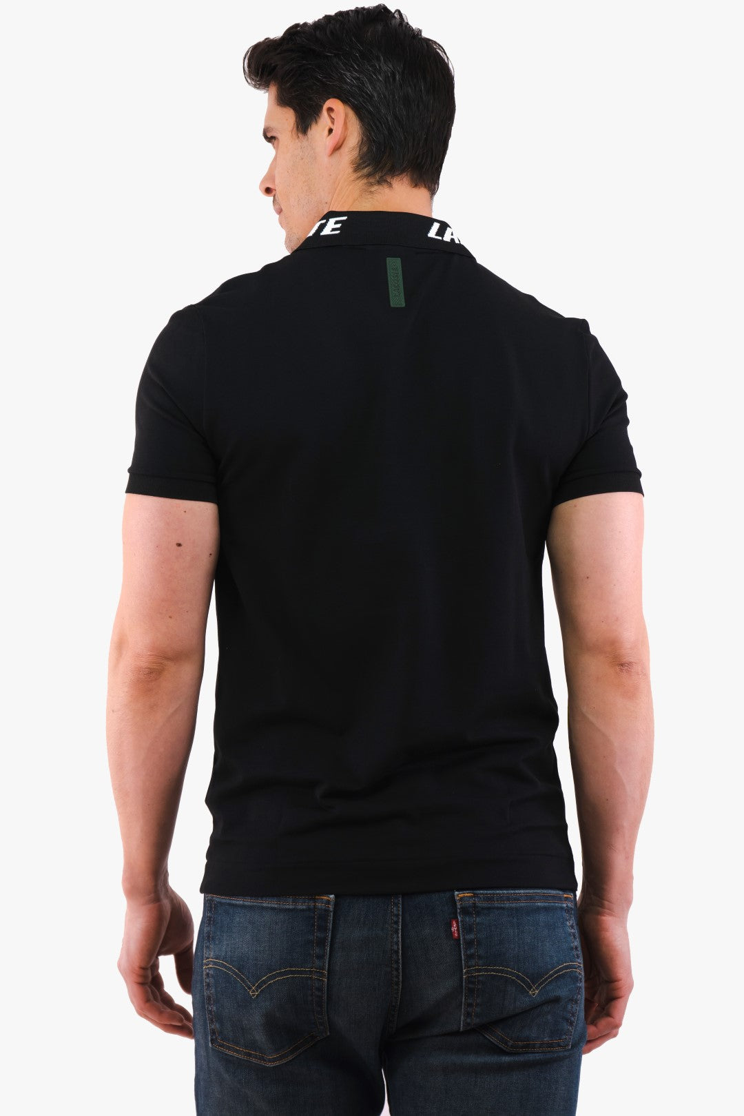 Polo Lacoste de couleur Noir
