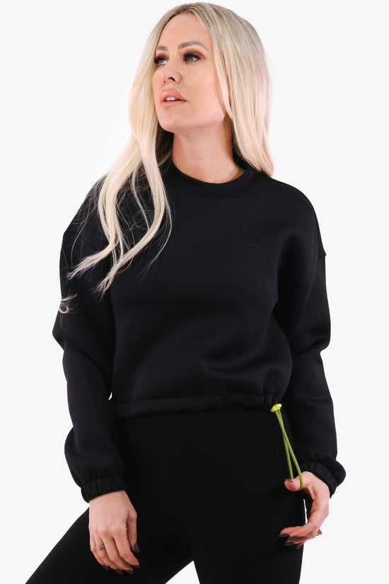 Black Lacoste sweater
